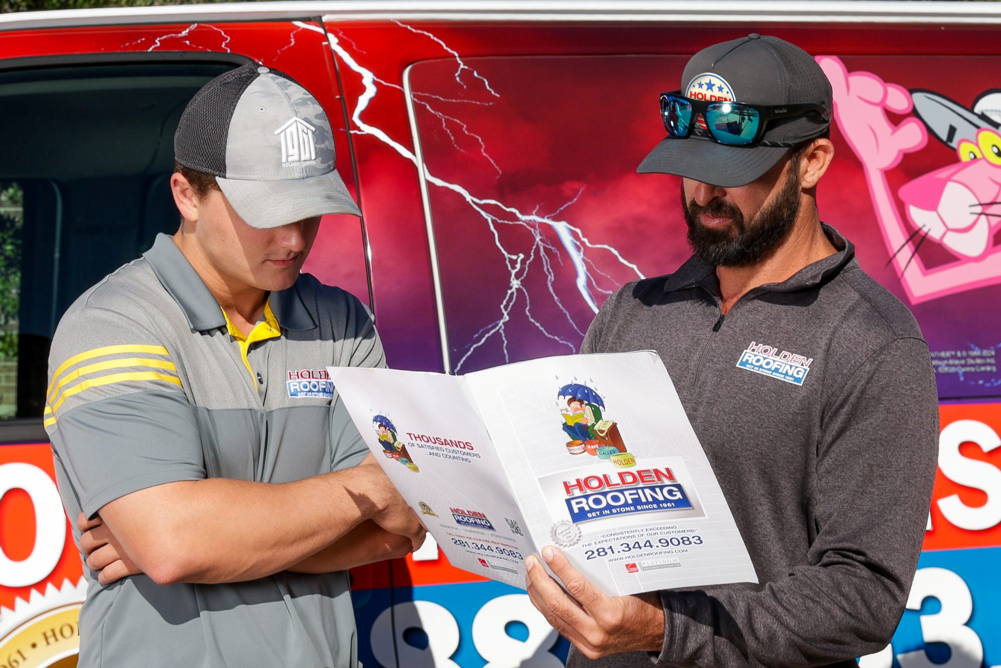 Holden project managers going over the inspection report
