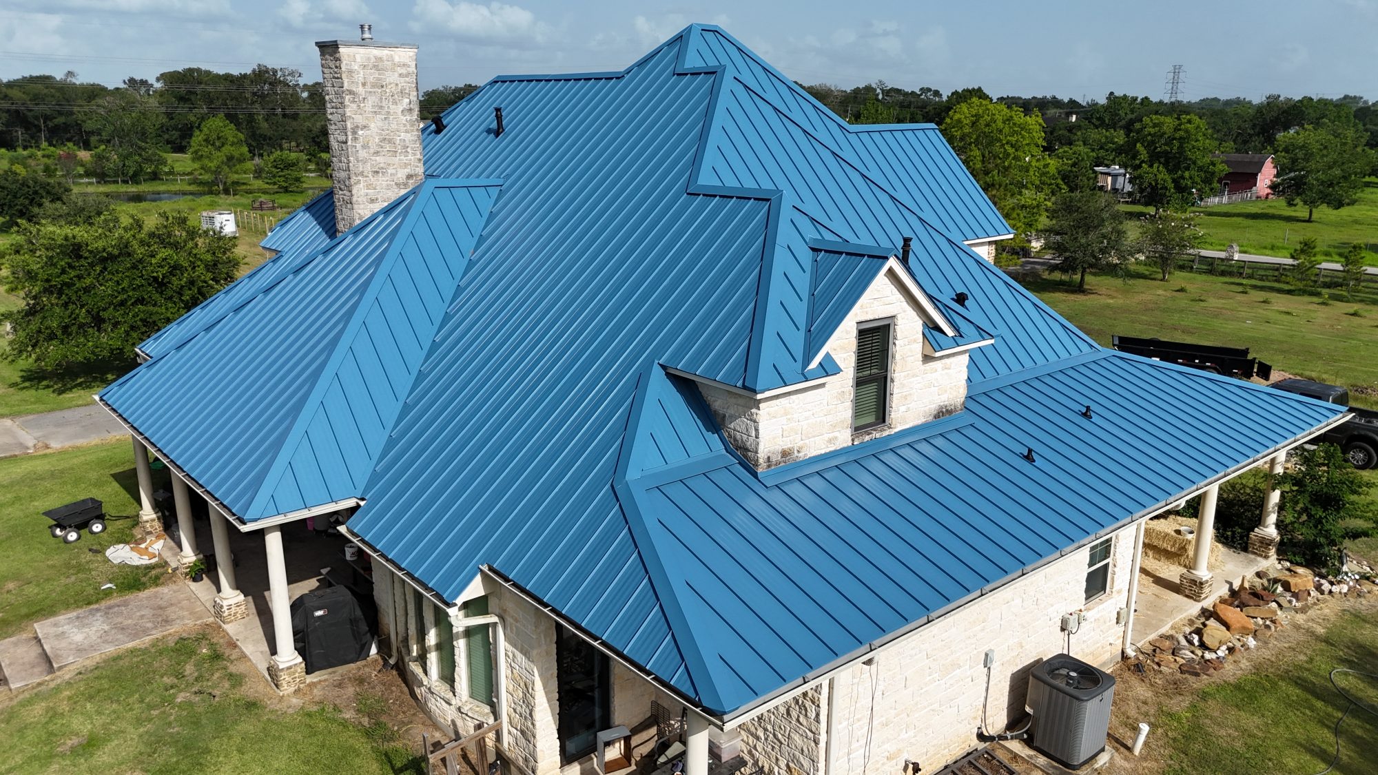 roofing contractor Cedar Park TX, Holden Roofing Austin standing seam metal roof replacement on a Twin Creeks hill country home, metal roofing, tile roofing and shingle roof replacement serving Cedar Park, Lago Vista, Leander and Liberty Hill