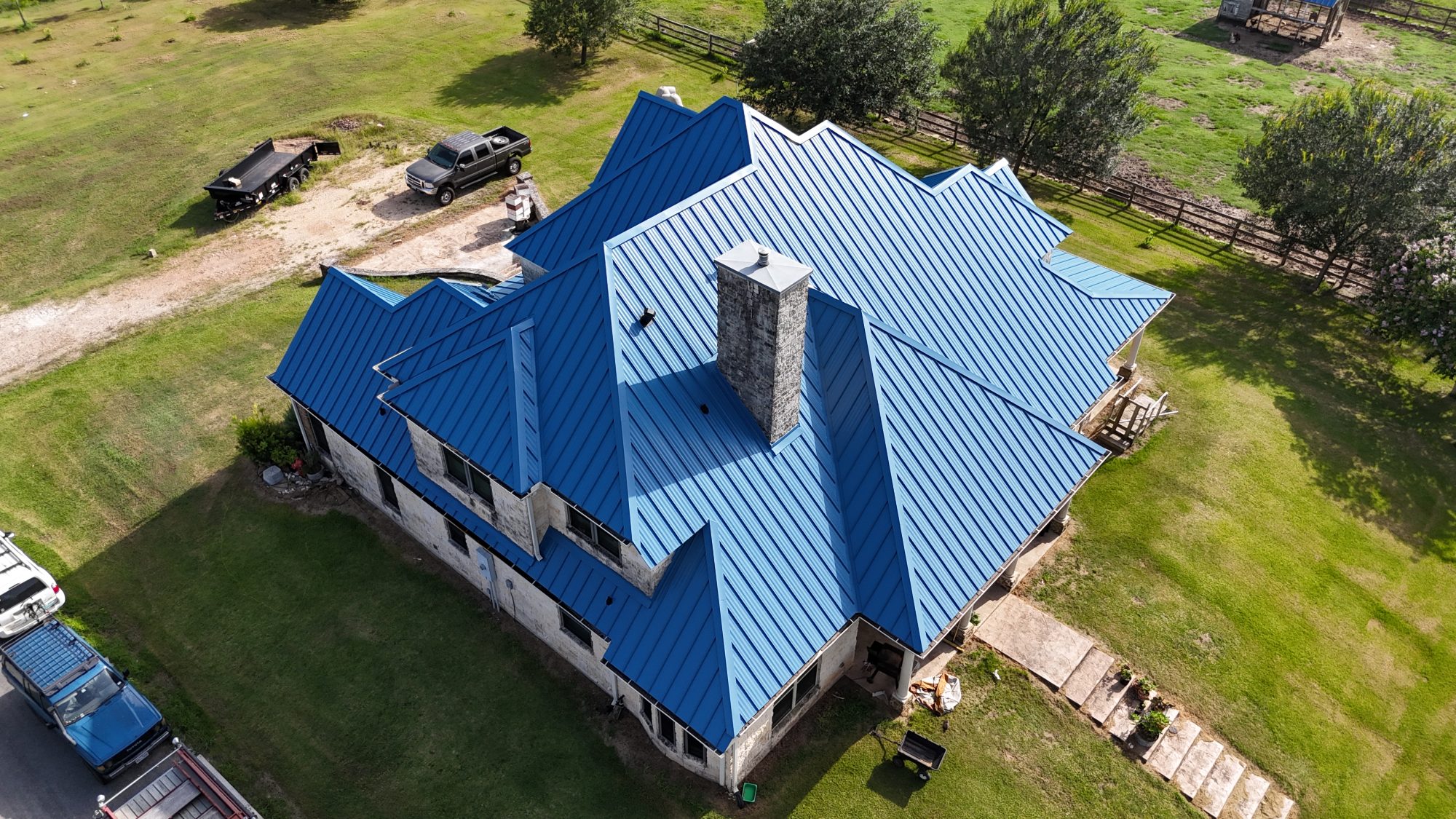 Blue standing seam metal roof from above