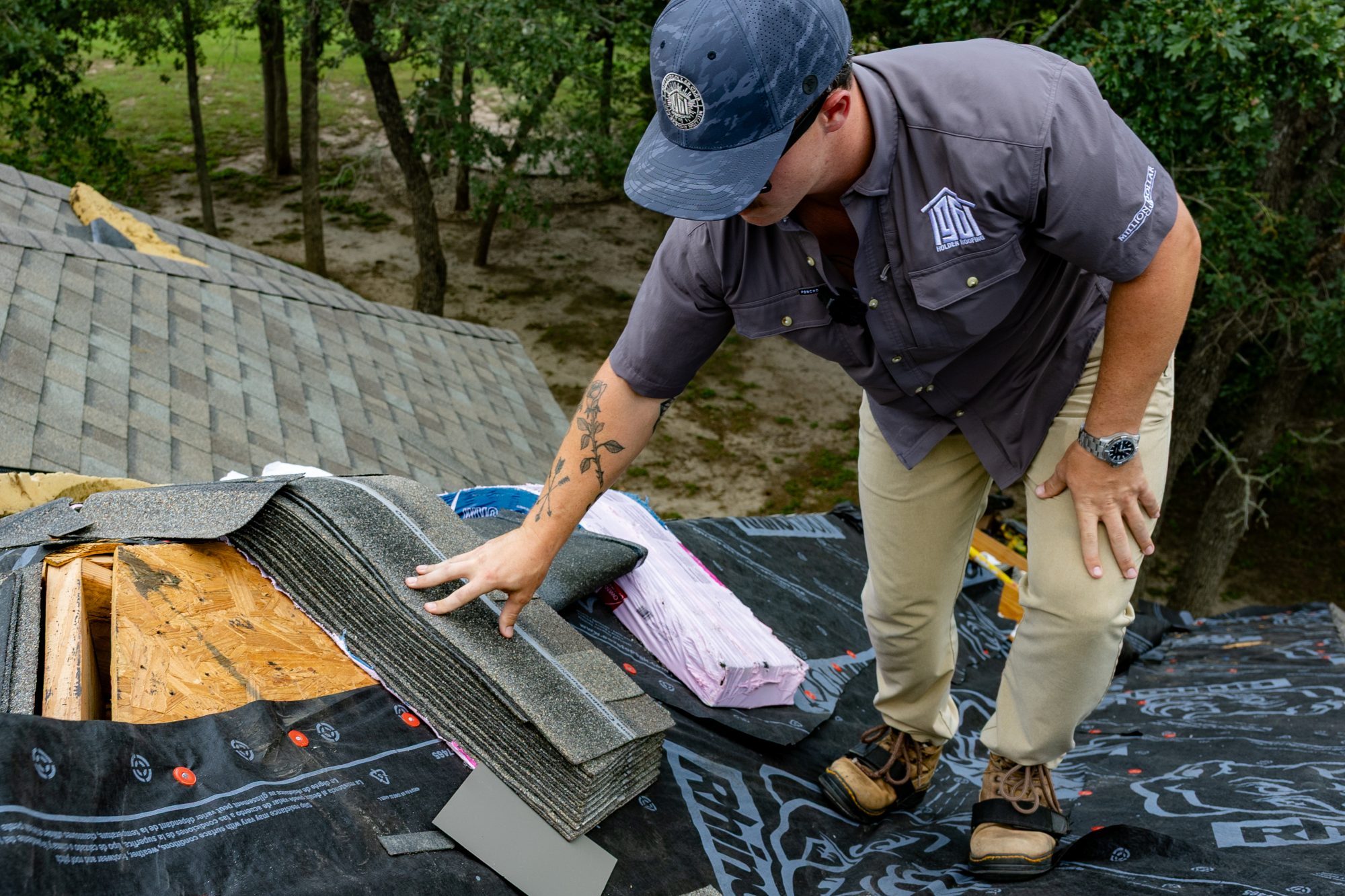 Laying new underlayment and ice-and-water shield during a replacement