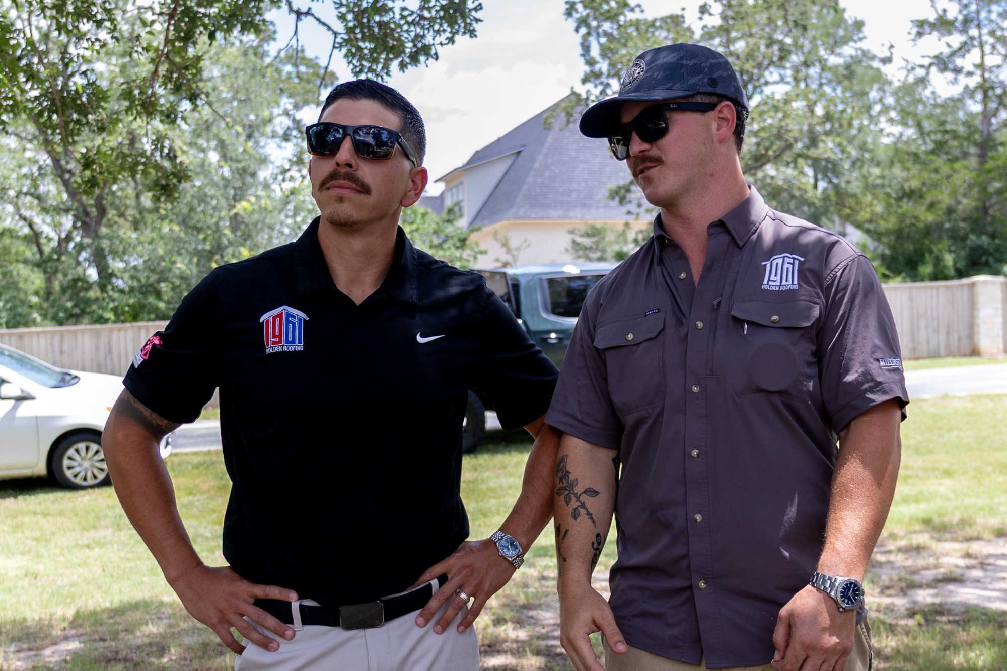 Two Holden Roofing project managers on a job site