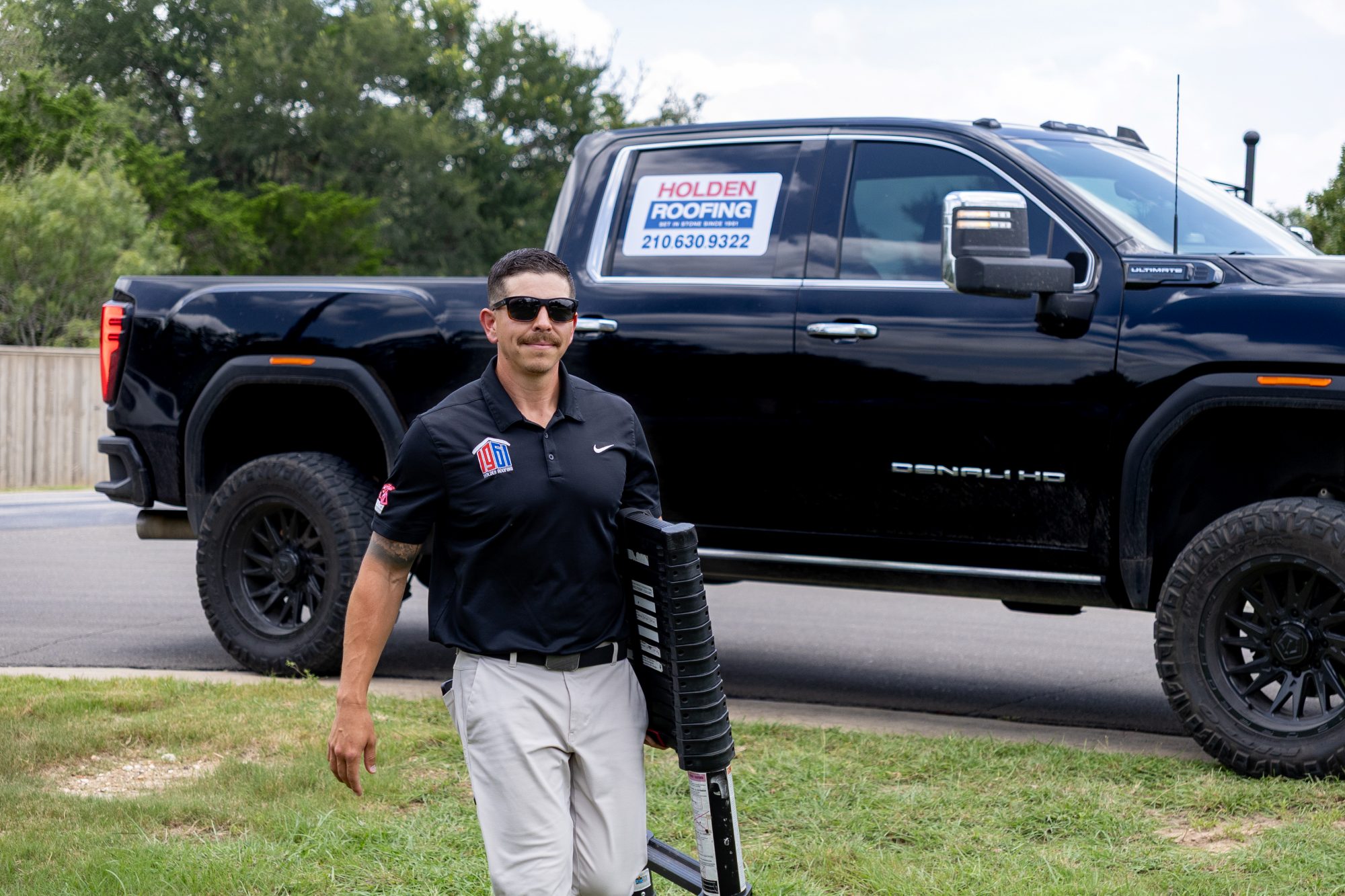 A Holden project manager with the company truck
