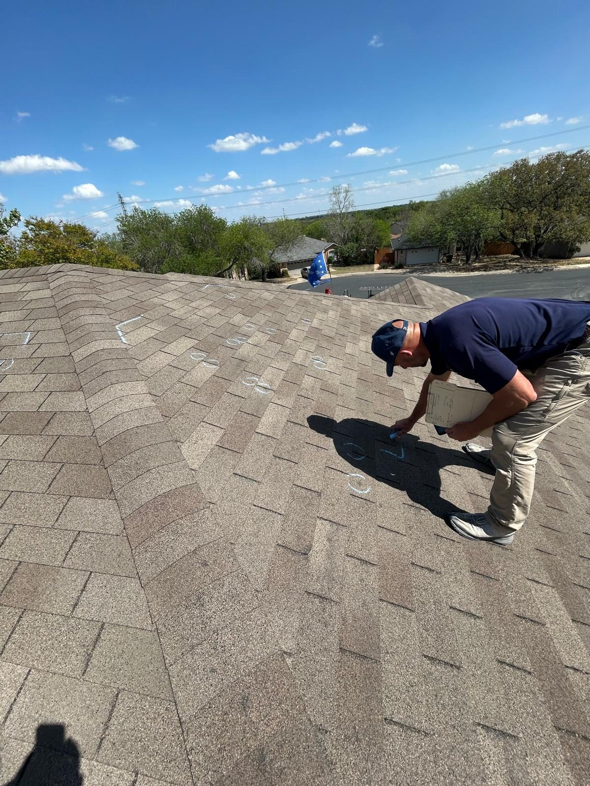 Inspecting a shingle roof