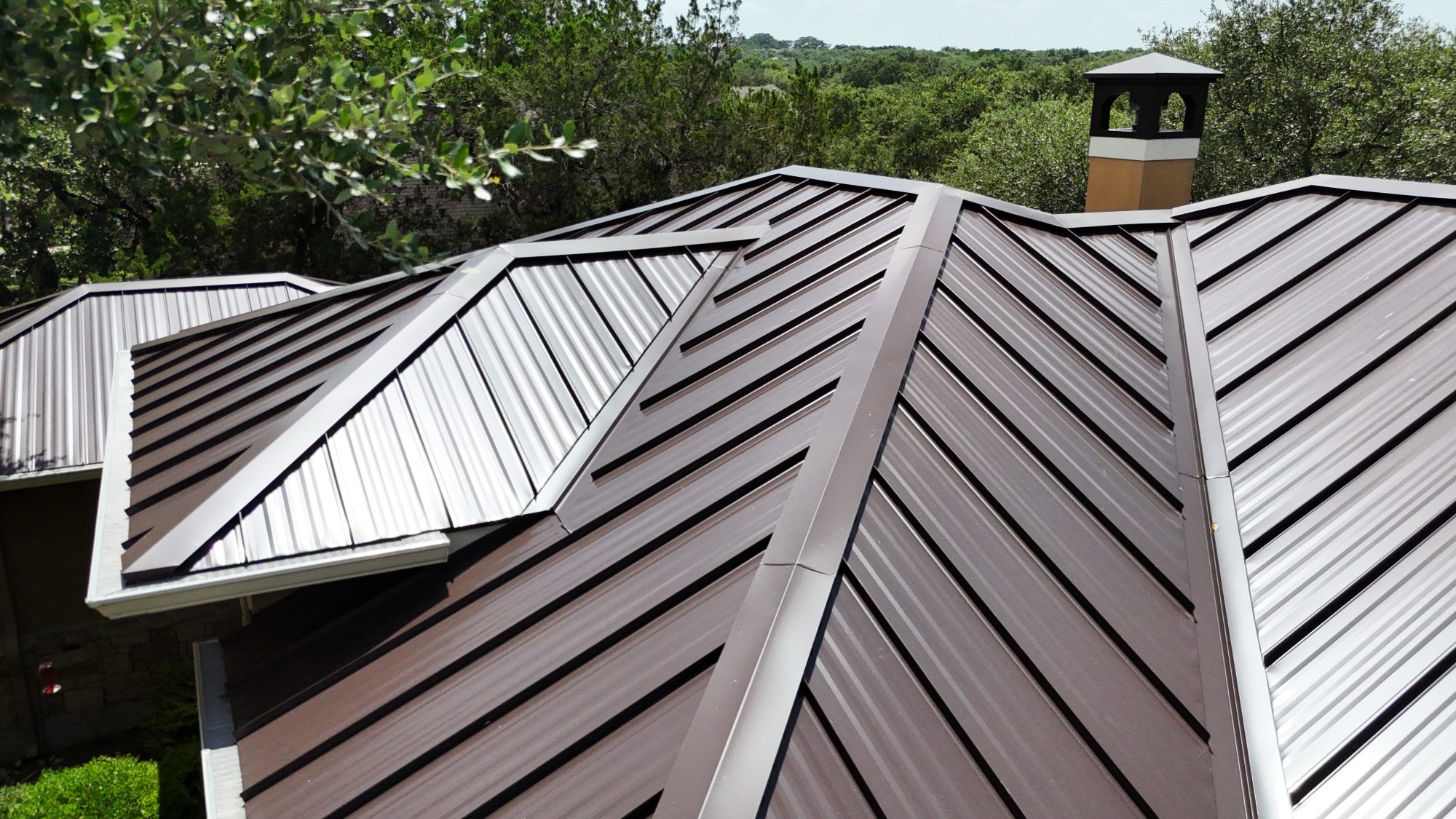 Standing seam metal roof with a cupola