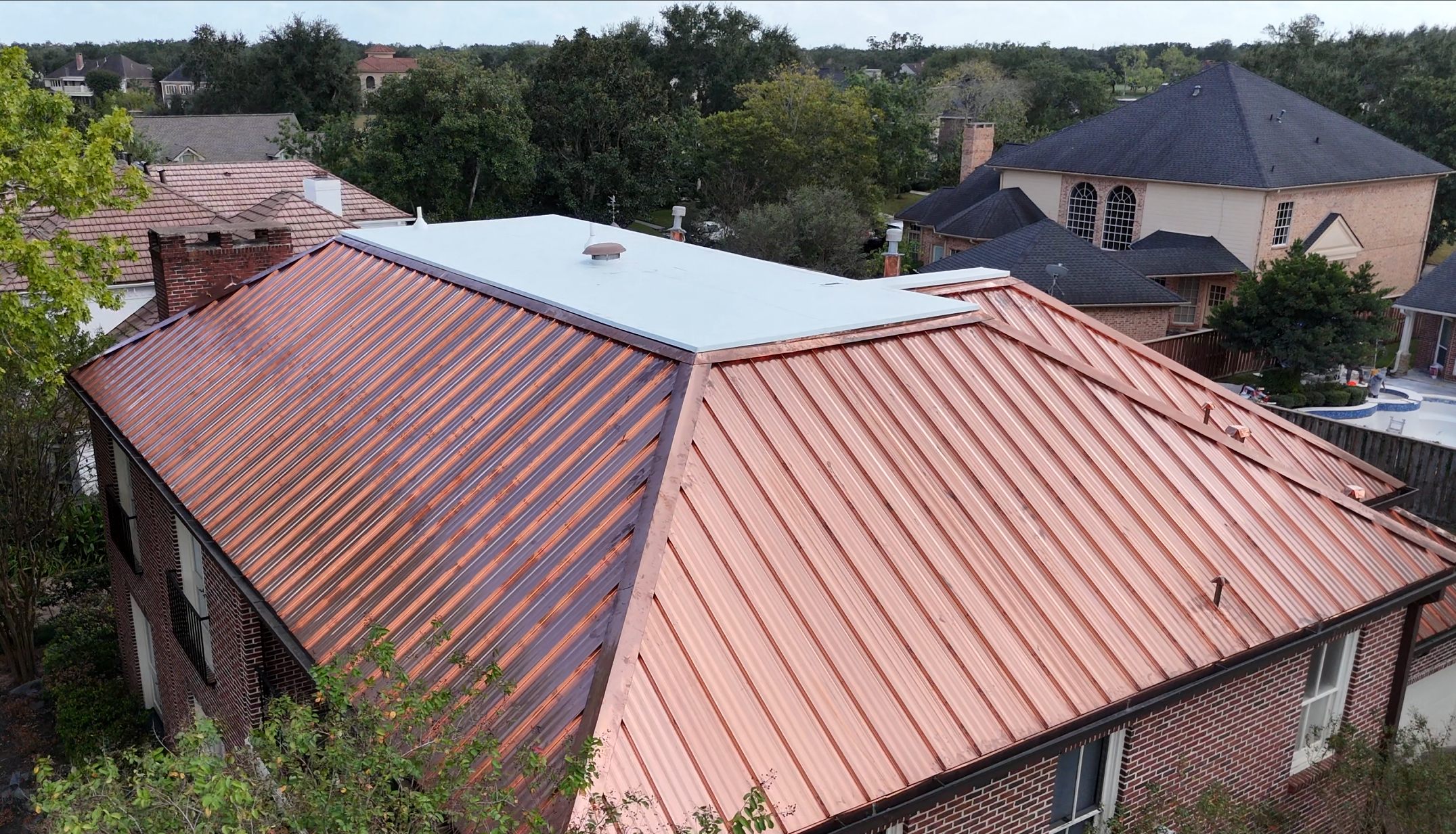 Copper standing seam metal roof, aerial